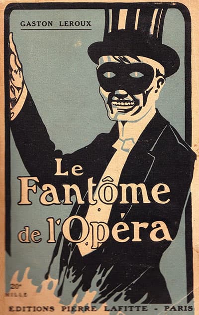 Cover of the French edition of Gaston Leroux's Le Fantome de l'Opera, showing a masked figure in top hat and evening dress