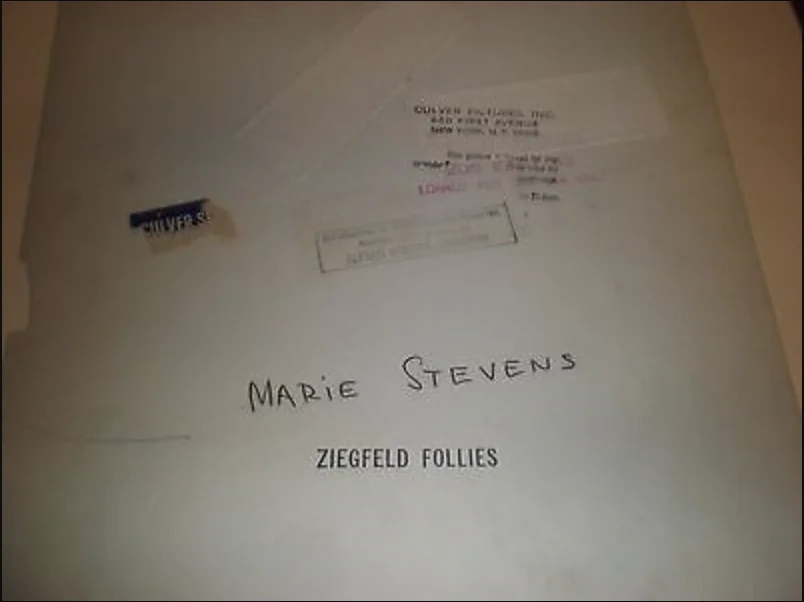 Verso of the Culver Pictures print with Culver's address stamp, a Ziegfeld Follies stamp, Alfred Cheney Johnston's credit stamp and the name Marie Stevens written in pencil