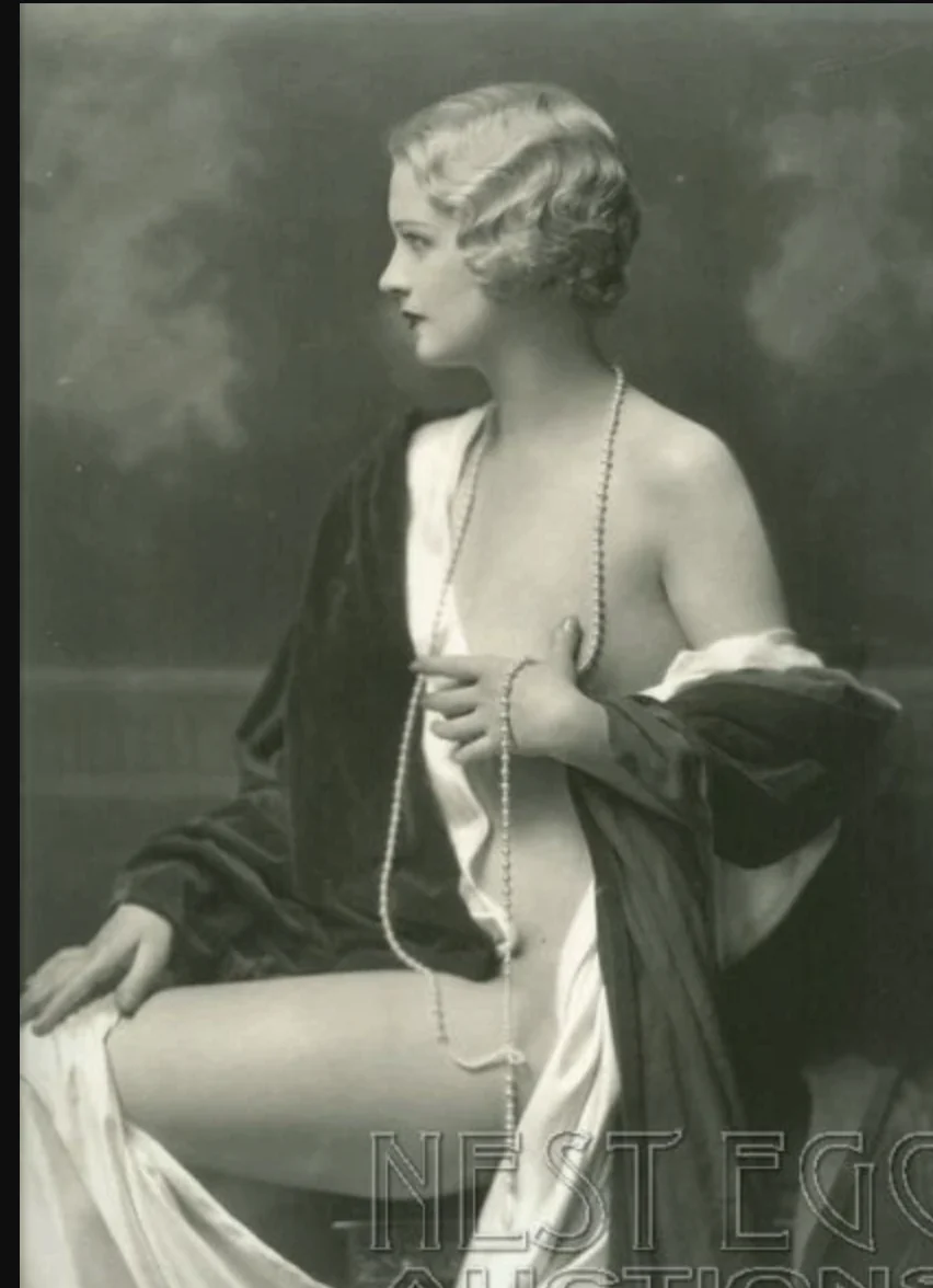 Lot 152 in Nest Egg Auctions’ 2011 sale of Alfred Cheney Johnston’s own photo archive: the same seated study in pearls, catalogued as Marie Stevens; auction-house watermark